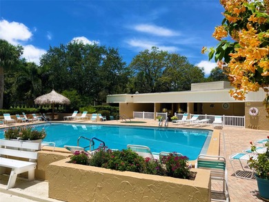 Stunning Resort-Style Condo with Designer Finishes and on Cove Cay Country Club in Florida - for sale on GolfHomes.com, golf home, golf lot