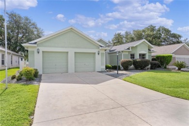 Welcome to this Exceptional EXPANDED LANTANA/BRADFORD MODEL on The Links of Spruce Creek in Florida - for sale on GolfHomes.com, golf home, golf lot