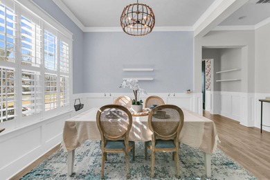 Step inside this impressive three-story residence in the on Dunes West Golf Club in South Carolina - for sale on GolfHomes.com, golf home, golf lot