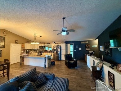 Discover the perfect blend of space, comfort, and privacy in on Oak Hills Country Club in Missouri - for sale on GolfHomes.com, golf home, golf lot