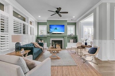 Step inside this impressive three-story residence in the on Dunes West Golf Club in South Carolina - for sale on GolfHomes.com, golf home, golf lot