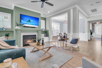 Step inside this impressive three-story residence in the on Dunes West Golf Club in South Carolina - for sale on GolfHomes.com, golf home, golf lot