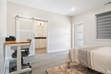 Welcome to your dream home where modern design, spacious living on Cedar Ridge Golf Course in Utah - for sale on GolfHomes.com, golf home, golf lot
