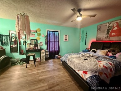 Discover the perfect blend of space, comfort, and privacy in on Oak Hills Country Club in Missouri - for sale on GolfHomes.com, golf home, golf lot