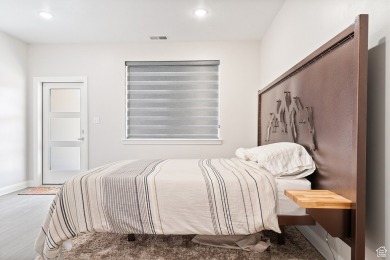 Welcome to your dream home where modern design, spacious living on Cedar Ridge Golf Course in Utah - for sale on GolfHomes.com, golf home, golf lot