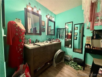 Discover the perfect blend of space, comfort, and privacy in on Oak Hills Country Club in Missouri - for sale on GolfHomes.com, golf home, golf lot