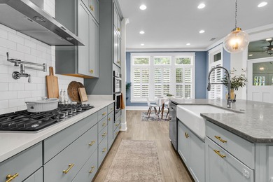 Step inside this impressive three-story residence in the on Dunes West Golf Club in South Carolina - for sale on GolfHomes.com, golf home, golf lot