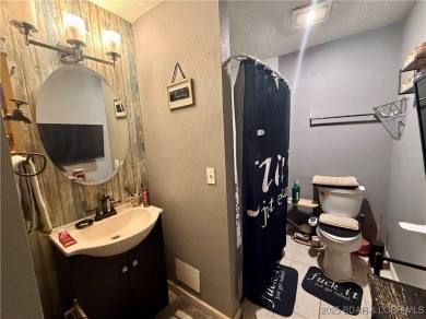Discover the perfect blend of space, comfort, and privacy in on Oak Hills Country Club in Missouri - for sale on GolfHomes.com, golf home, golf lot