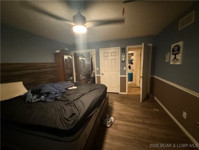 Discover the perfect blend of space, comfort, and privacy in on Oak Hills Country Club in Missouri - for sale on GolfHomes.com, golf home, golf lot