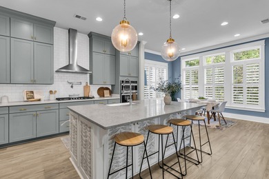 Step inside this impressive three-story residence in the on Dunes West Golf Club in South Carolina - for sale on GolfHomes.com, golf home, golf lot