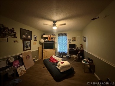 Discover the perfect blend of space, comfort, and privacy in on Oak Hills Country Club in Missouri - for sale on GolfHomes.com, golf home, golf lot