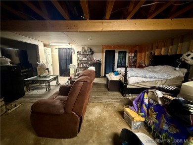 Discover the perfect blend of space, comfort, and privacy in on Oak Hills Country Club in Missouri - for sale on GolfHomes.com, golf home, golf lot
