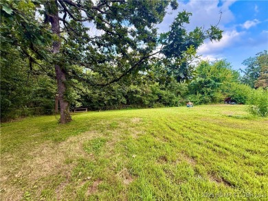 Discover the perfect blend of space, comfort, and privacy in on Oak Hills Country Club in Missouri - for sale on GolfHomes.com, golf home, golf lot