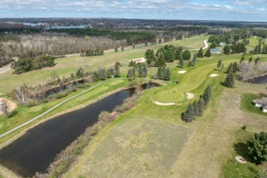 Centrally located in Canadian Lakes is the beautiful 3 bedroom on Canadian Lakes Country Club-The Royal Course in Michigan - for sale on GolfHomes.com, golf home, golf lot