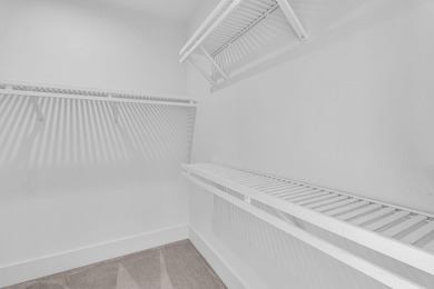 Step inside this impressive three-story residence in the on Dunes West Golf Club in South Carolina - for sale on GolfHomes.com, golf home, golf lot