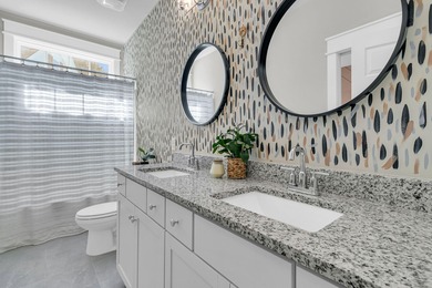 Step inside this impressive three-story residence in the on Dunes West Golf Club in South Carolina - for sale on GolfHomes.com, golf home, golf lot