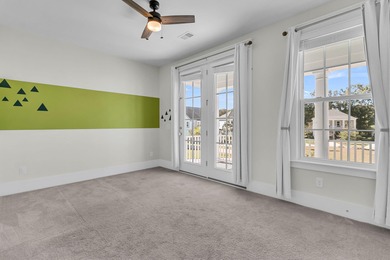 Step inside this impressive three-story residence in the on Dunes West Golf Club in South Carolina - for sale on GolfHomes.com, golf home, golf lot