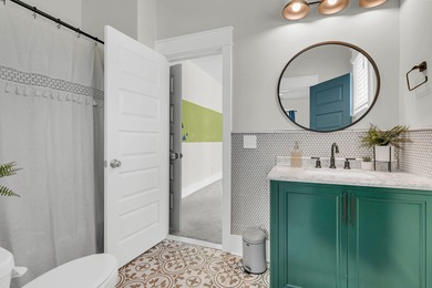 Step inside this impressive three-story residence in the on Dunes West Golf Club in South Carolina - for sale on GolfHomes.com, golf home, golf lot