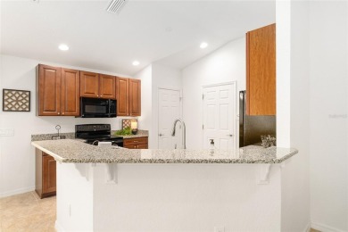 This Charming home is situated in the highly sought-after Gated on Miona Lake Golf Club in Florida - for sale on GolfHomes.com, golf home, golf lot