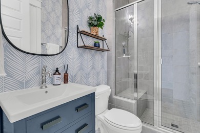 Step inside this impressive three-story residence in the on Dunes West Golf Club in South Carolina - for sale on GolfHomes.com, golf home, golf lot