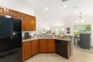 This Charming home is situated in the highly sought-after Gated on Miona Lake Golf Club in Florida - for sale on GolfHomes.com, golf home, golf lot