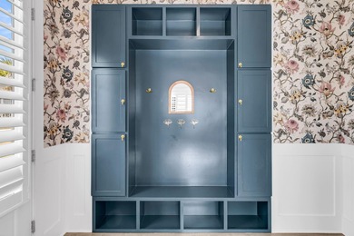 Step inside this impressive three-story residence in the on Dunes West Golf Club in South Carolina - for sale on GolfHomes.com, golf home, golf lot