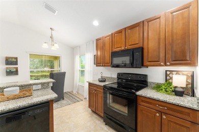 This Charming home is situated in the highly sought-after Gated on Miona Lake Golf Club in Florida - for sale on GolfHomes.com, golf home, golf lot