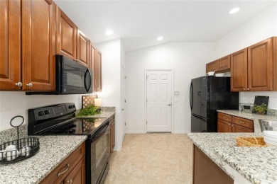 This Charming home is situated in the highly sought-after Gated on Miona Lake Golf Club in Florida - for sale on GolfHomes.com, golf home, golf lot