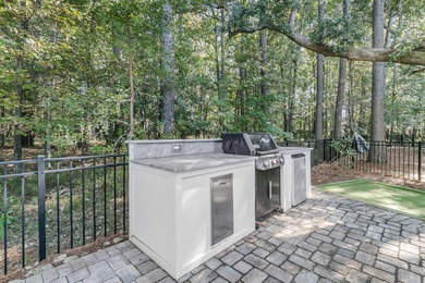 Step inside this impressive three-story residence in the on Dunes West Golf Club in South Carolina - for sale on GolfHomes.com, golf home, golf lot