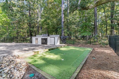 Step inside this impressive three-story residence in the on Dunes West Golf Club in South Carolina - for sale on GolfHomes.com, golf home, golf lot