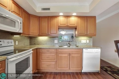 DRASTIC PRICE REDUCTION FOR QUICK SALE! STEP INTO TRANQUIL on Wynmoor Golf Course in Florida - for sale on GolfHomes.com, golf home, golf lot