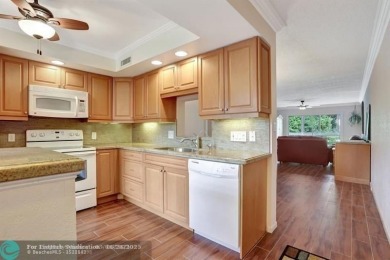 DRASTIC PRICE REDUCTION FOR QUICK SALE! STEP INTO TRANQUIL on Wynmoor Golf Course in Florida - for sale on GolfHomes.com, golf home, golf lot