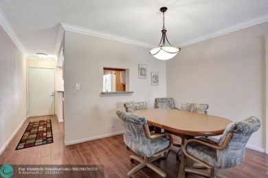 DRASTIC PRICE REDUCTION FOR QUICK SALE! STEP INTO TRANQUIL on Wynmoor Golf Course in Florida - for sale on GolfHomes.com, golf home, golf lot