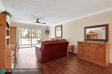 DRASTIC PRICE REDUCTION FOR QUICK SALE! STEP INTO TRANQUIL on Wynmoor Golf Course in Florida - for sale on GolfHomes.com, golf home, golf lot