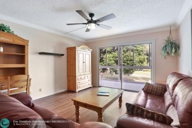 DRASTIC PRICE REDUCTION FOR QUICK SALE! STEP INTO TRANQUIL on Wynmoor Golf Course in Florida - for sale on GolfHomes.com, golf home, golf lot