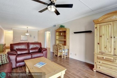 DRASTIC PRICE REDUCTION FOR QUICK SALE! STEP INTO TRANQUIL on Wynmoor Golf Course in Florida - for sale on GolfHomes.com, golf home, golf lot