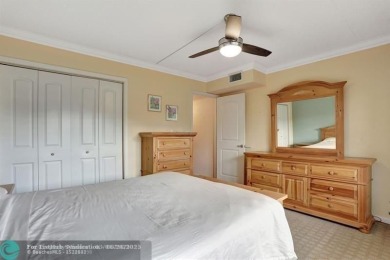 DRASTIC PRICE REDUCTION FOR QUICK SALE! STEP INTO TRANQUIL on Wynmoor Golf Course in Florida - for sale on GolfHomes.com, golf home, golf lot