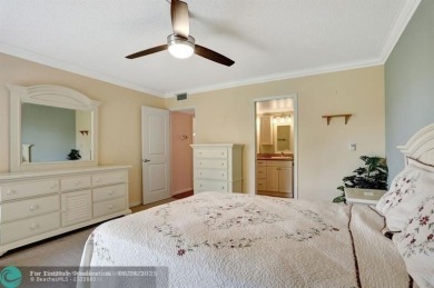 DRASTIC PRICE REDUCTION FOR QUICK SALE! STEP INTO TRANQUIL on Wynmoor Golf Course in Florida - for sale on GolfHomes.com, golf home, golf lot