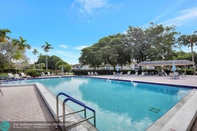 DRASTIC PRICE REDUCTION FOR QUICK SALE! STEP INTO TRANQUIL on Wynmoor Golf Course in Florida - for sale on GolfHomes.com, golf home, golf lot