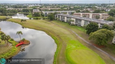 DRASTIC PRICE REDUCTION FOR QUICK SALE! STEP INTO TRANQUIL on Wynmoor Golf Course in Florida - for sale on GolfHomes.com, golf home, golf lot