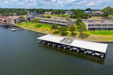Enjoy lakefront living in this charming 2 bedroom, 1.5 bath on De Cordova Bend Country Club in Texas - for sale on GolfHomes.com, golf home, golf lot