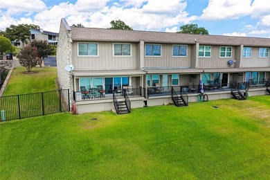 Enjoy lakefront living in this charming 2 bedroom, 1.5 bath on De Cordova Bend Country Club in Texas - for sale on GolfHomes.com, golf home, golf lot