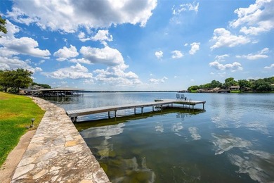 Enjoy lakefront living in this charming 2 bedroom, 1.5 bath on De Cordova Bend Country Club in Texas - for sale on GolfHomes.com, golf home, golf lot