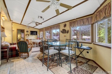 Cozy and character-filled nestled in a quiet lake community just on River Ridge Golf Club in Virginia - for sale on GolfHomes.com, golf home, golf lot