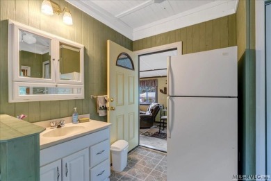 Cozy and character-filled nestled in a quiet lake community just on River Ridge Golf Club in Virginia - for sale on GolfHomes.com, golf home, golf lot