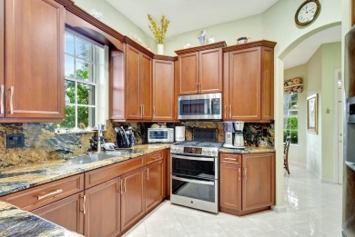 Immaculate Large End Unit Townhome in Highly Sought After on PGA National Golf Club in Florida - for sale on GolfHomes.com, golf home, golf lot