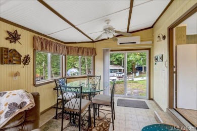 Cozy and character-filled nestled in a quiet lake community just on River Ridge Golf Club in Virginia - for sale on GolfHomes.com, golf home, golf lot