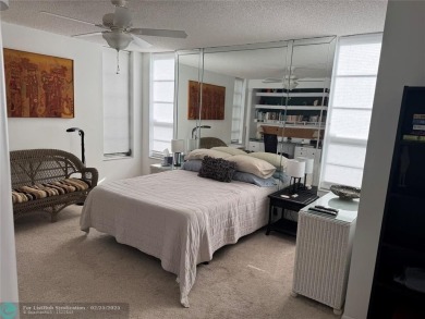 Convenient first floor unit condo in the tropical Palm Aire on Palm-Aire Country Club and Resort - The Oaks in Florida - for sale on GolfHomes.com, golf home, golf lot