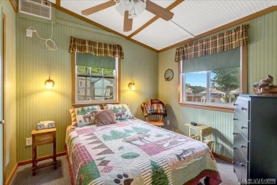 Cozy and character-filled nestled in a quiet lake community just on River Ridge Golf Club in Virginia - for sale on GolfHomes.com, golf home, golf lot