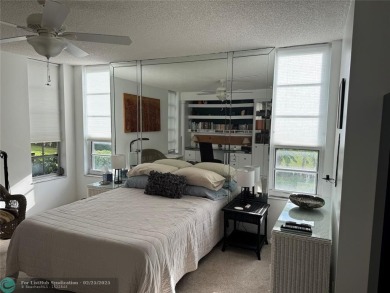 Convenient first floor unit condo in the tropical Palm Aire on Palm-Aire Country Club and Resort - The Oaks in Florida - for sale on GolfHomes.com, golf home, golf lot